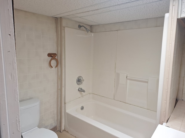 1271 Featherstone Rd, Pontiac, MI 48342 - full bath featuring toilet, tile patterned flooring, and washtub / shower combination