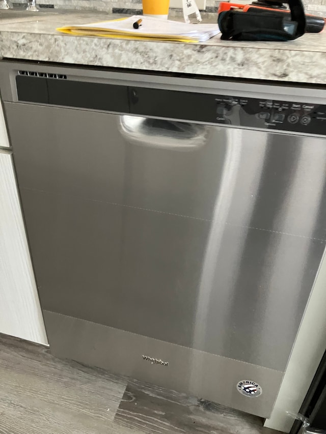 1271 Featherstone Rd, Pontiac, MI 48342 - details featuring light countertops and stainless steel dishwasher