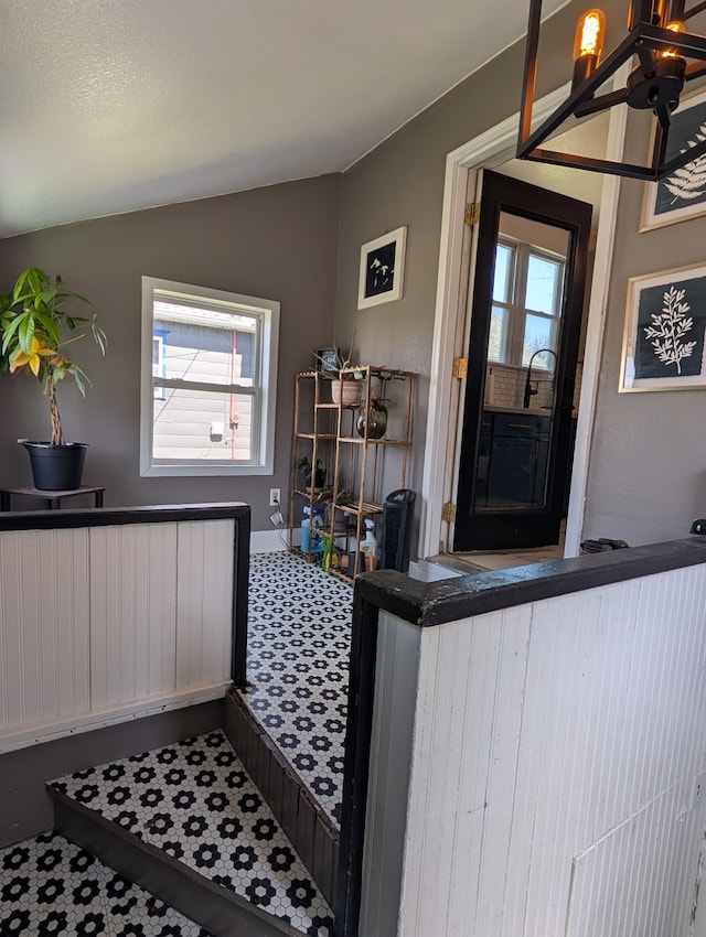 interior space featuring lofted ceiling
