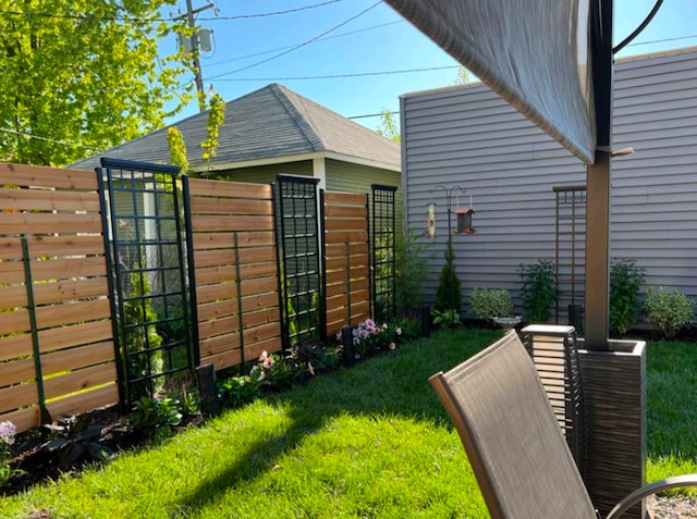 view of yard with fence
