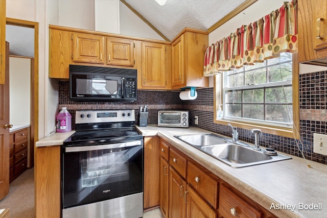kitchen featuring a sink, stainless steel electric range, black microwave, light countertops, and a textured ceiling
