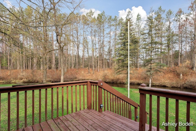 deck featuring a lawn