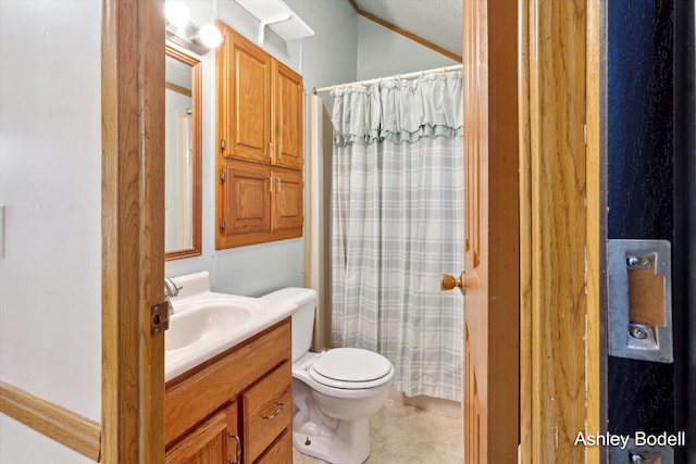bathroom with toilet, a shower with curtain, lofted ceiling, and vanity