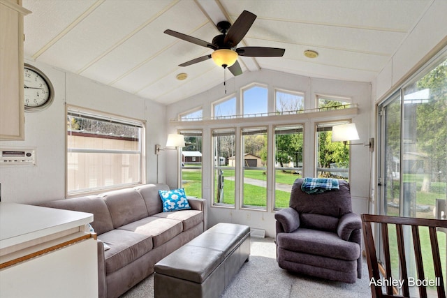 sunroom / solarium featuring ceiling fan and a wealth of natural light