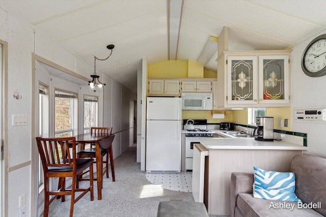 kitchen with glass insert cabinets, white appliances, vaulted ceiling with beams, a peninsula, and light countertops
