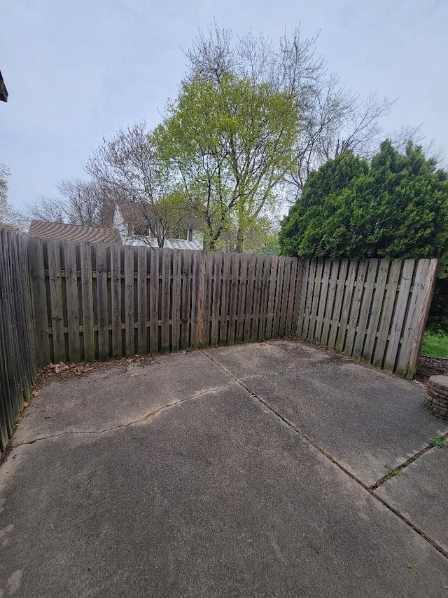 view of patio / terrace with fence