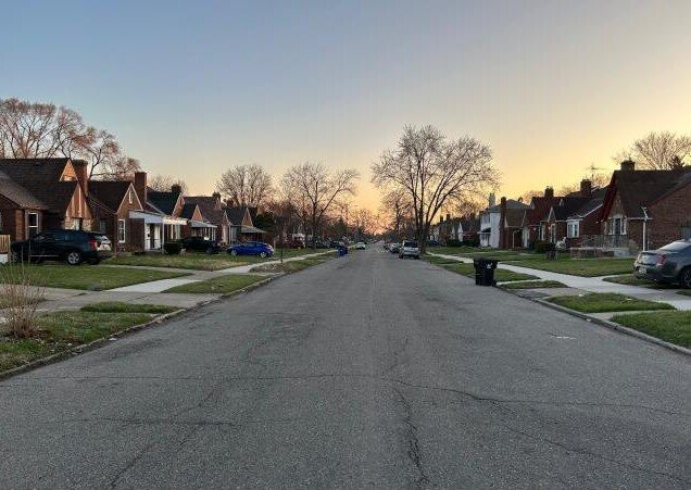 view of street featuring a residential view, sidewalks, and curbs