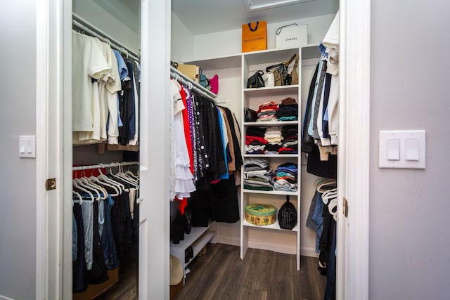 spacious closet with wood finished floors