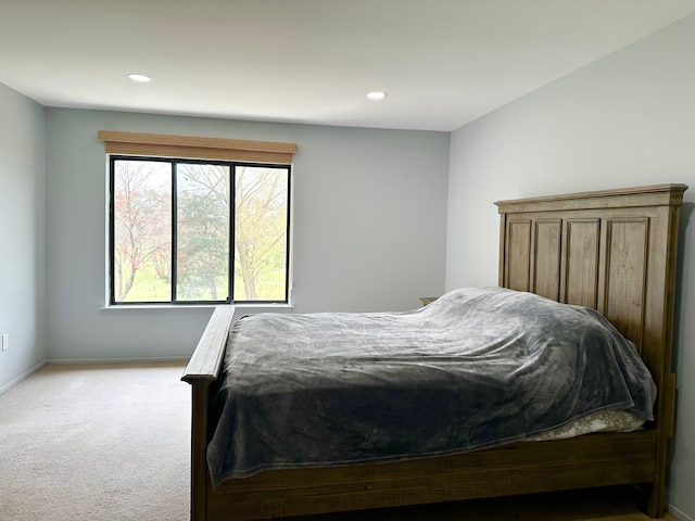 carpeted bedroom with baseboards and recessed lighting