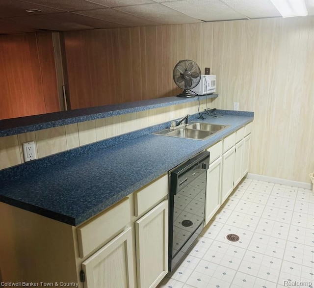 25204 Franklin Ter # 6, South Lyon, MI 48178 - kitchen with a sink, wooden walls, dishwasher, light floors, and white microwave