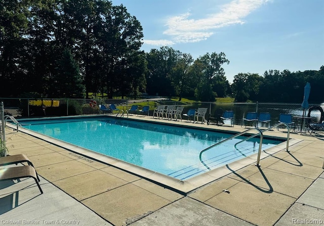 25204 Franklin Ter # 6, South Lyon, MI 48178 - community pool with fence and a patio