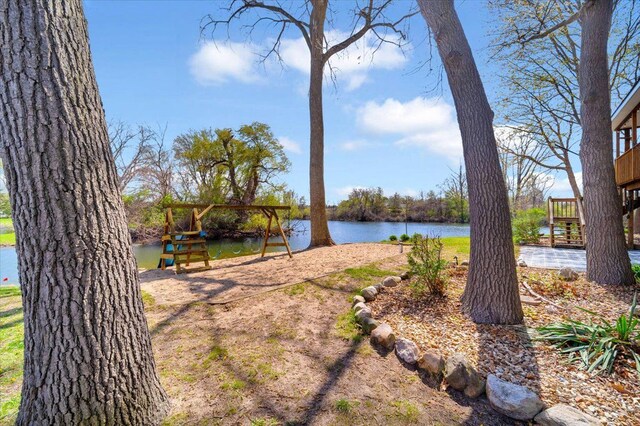 exterior space with a water view