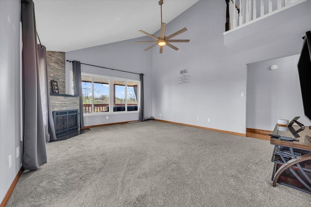 unfurnished living room featuring a ceiling fan, a fireplace, high vaulted ceiling, baseboards, and carpet flooring