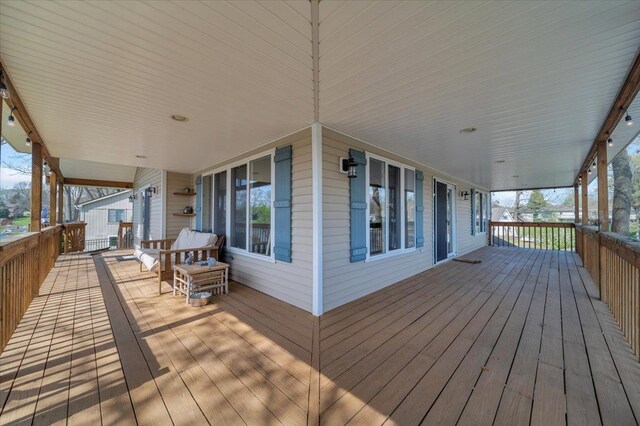 deck featuring covered porch