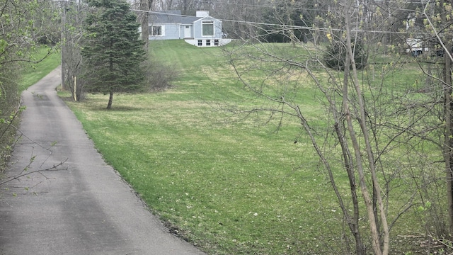 exterior space featuring aphalt driveway