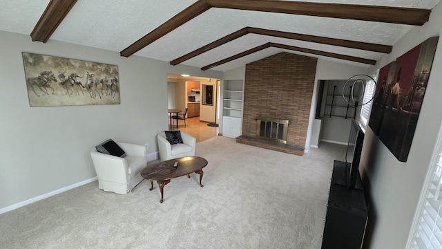 living area featuring vaulted ceiling with beams, built in features, carpet, a fireplace, and baseboards