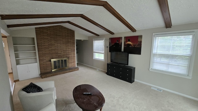 unfurnished living room featuring baseboards, visible vents, vaulted ceiling with beams, and a textured ceiling