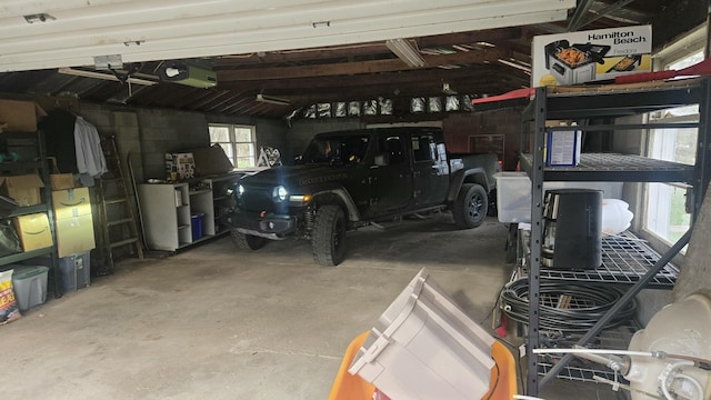 garage featuring a garage door opener