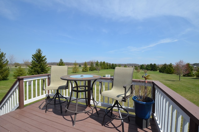 deck featuring a yard