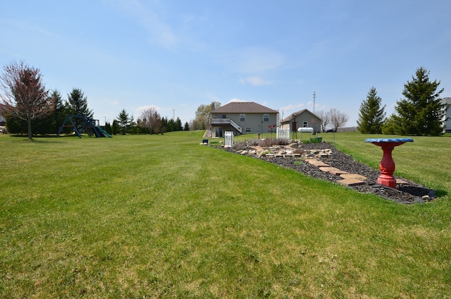 view of yard with a playground