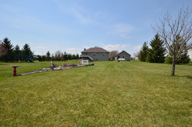 view of yard featuring a playground