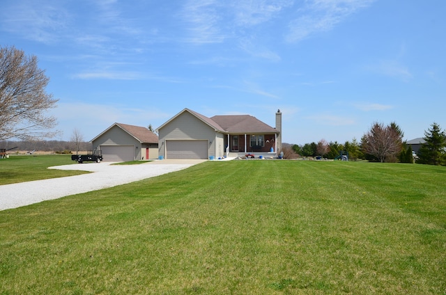 single story home featuring a front yard, gravel driveway, an attached garage, and a chimney