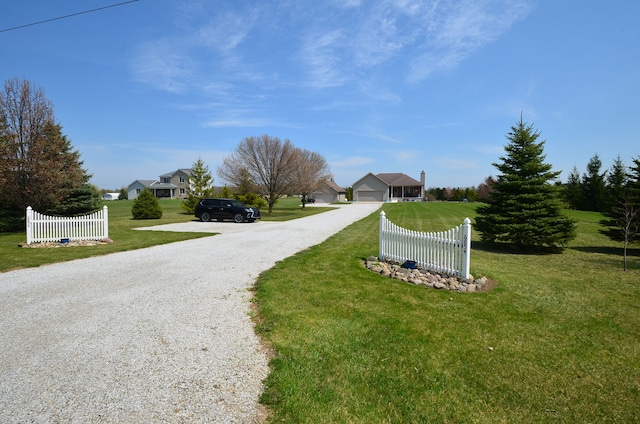 view of road featuring driveway