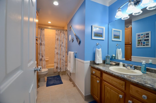 bathroom featuring recessed lighting, tile patterned floors, toilet, vanity, and shower / tub combo
