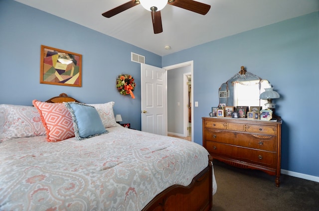 bedroom featuring carpet floors, visible vents, ceiling fan, and baseboards