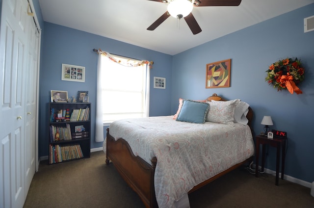 carpeted bedroom with baseboards, visible vents, ceiling fan, and a closet