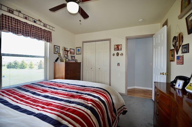 bedroom featuring ceiling fan, baseboards, carpet flooring, and a closet
