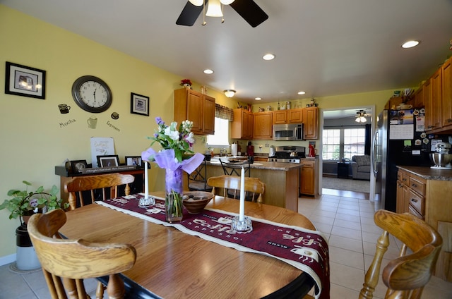 dining room featuring recessed lighting, ceiling fan, and light tile patterned flooring