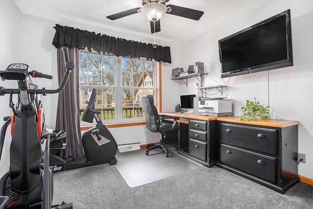 carpeted office space with visible vents, ceiling fan, and baseboards