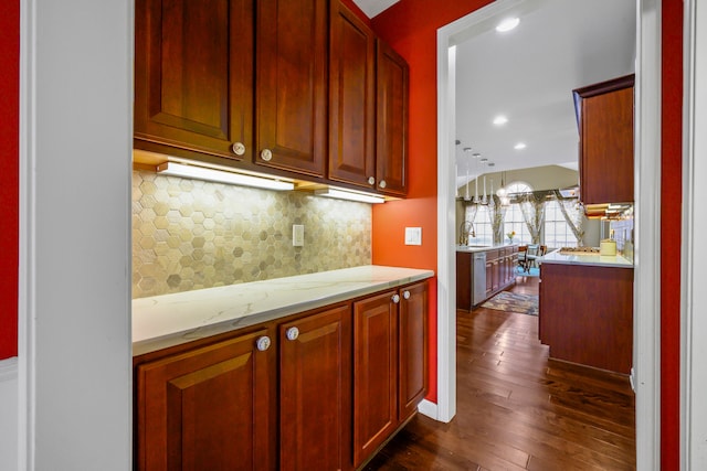 1249 Lasalle Rd, Canton, MI 48187 - kitchen with backsplash, stainless steel dishwasher, dark wood finished floors, a sink, and recessed lighting
