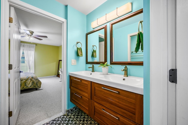 1249 Lasalle Rd, Canton, MI 48187 - ensuite bathroom featuring a ceiling fan, double vanity, and baseboards