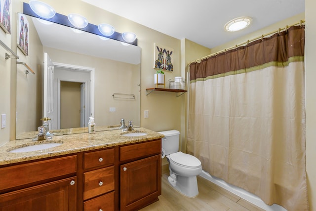1249 Lasalle Rd, Canton, MI 48187 - bathroom featuring wood finished floors, toilet, double vanity, and a shower with curtain