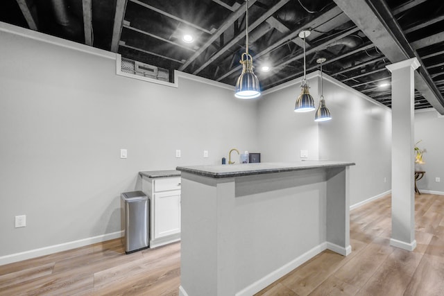 1249 Lasalle Rd, Canton, MI 48187 - kitchen featuring white cabinets, light wood-style floors, pendant lighting, and baseboards