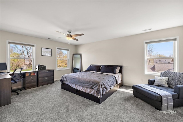 251 Dorsey St, Romeo, MI 48065 - carpeted bedroom with baseboards, visible vents, and ceiling fan
