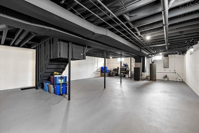 251 Dorsey St, Romeo, MI 48065 - basement with concrete block wall, stairs, gas water heater, and electric panel