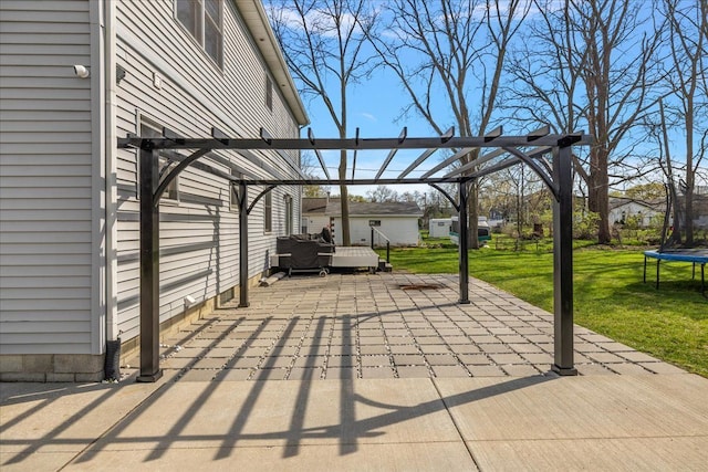 251 Dorsey St, Romeo, MI 48065 - view of patio featuring a trampoline and a pergola