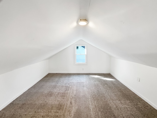 20612 Kingsville St, Harper Woods, MI 48225 - additional living space with carpet flooring, baseboards, and lofted ceiling