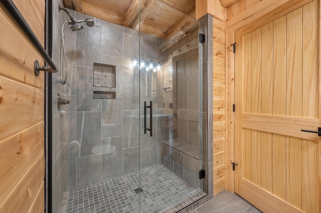 bathroom with a shower stall