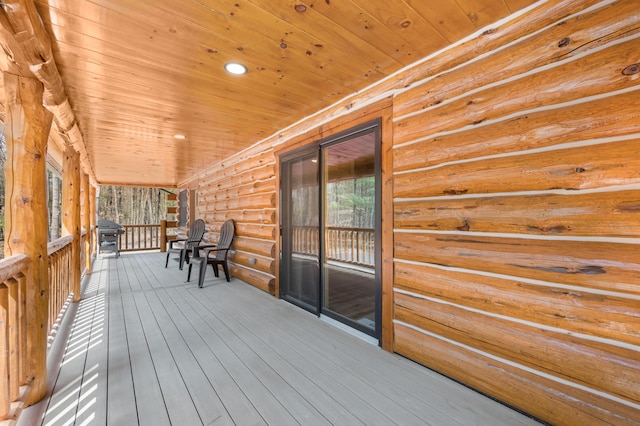 wooden terrace with covered porch