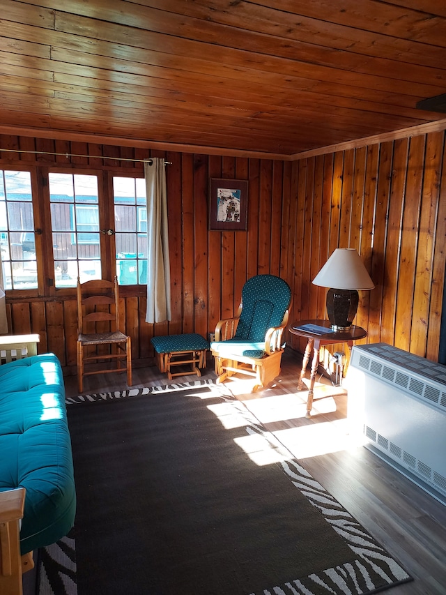 3974 W Houghton Lake Dr, Houghton Lake, MI 48629 - living area featuring wooden ceiling, wood finished floors, and wood walls