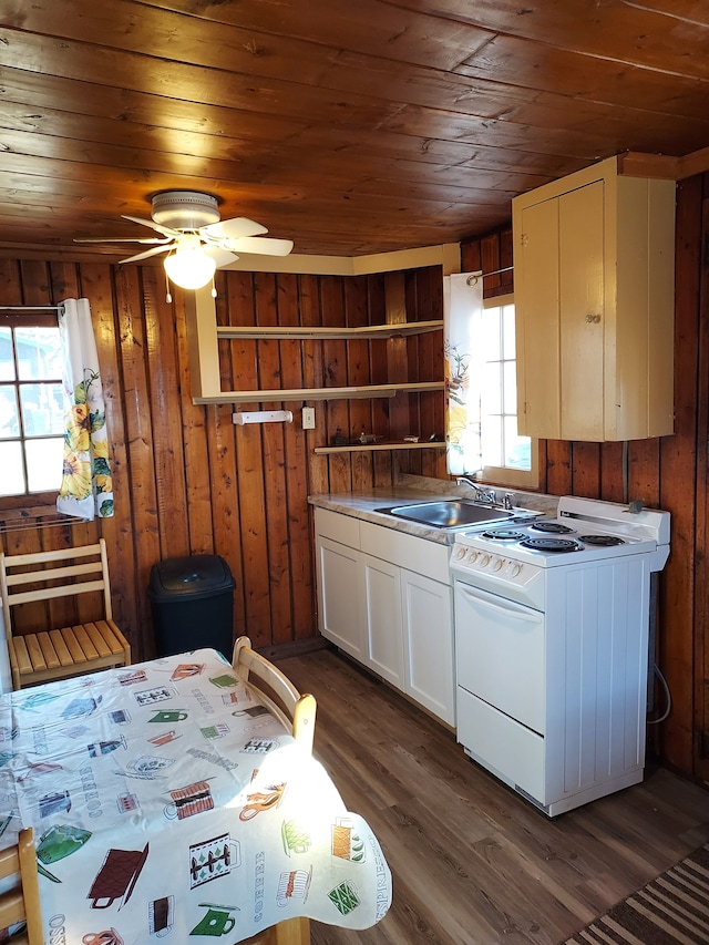 3974 W Houghton Lake Dr, Houghton Lake, MI 48629 - kitchen with white range with electric stovetop, wooden ceiling, wooden walls, white cabinetry, and a sink