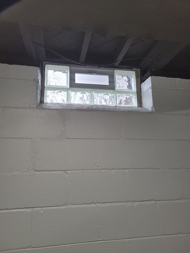 room details featuring concrete block wall