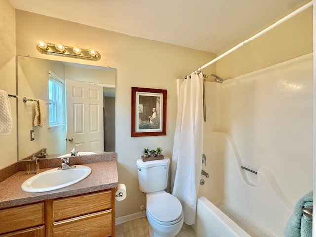 bathroom featuring shower / bath combination with curtain, toilet, and vanity
