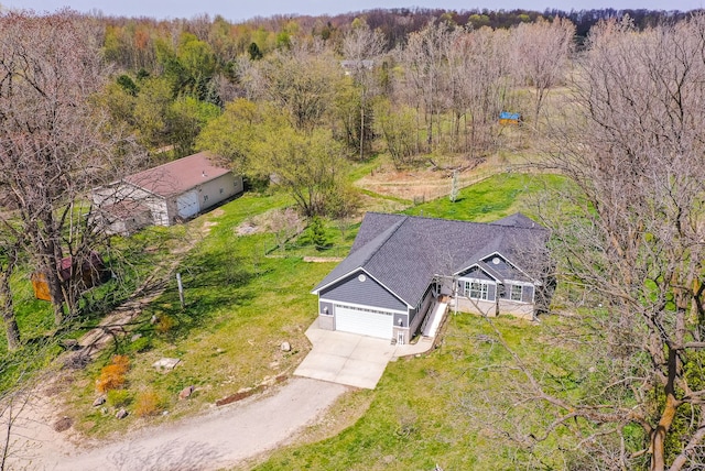 10207 Dodge Rd, Otisville, MI 48463 - aerial view featuring a wooded view