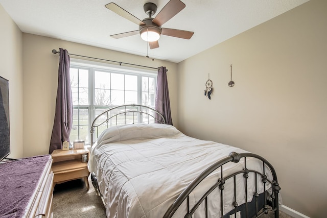 10207 Dodge Rd, Otisville, MI 48463 - carpeted bedroom with a ceiling fan