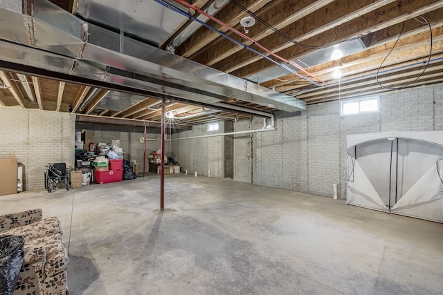 10207 Dodge Rd, Otisville, MI 48463 - below grade area with brick wall